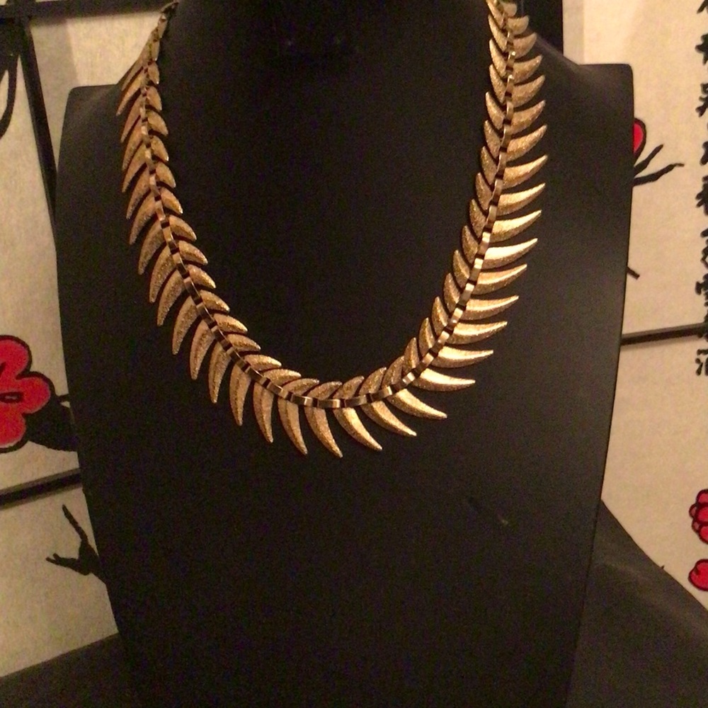 Gold Tone necklace with sparkling feathery accents